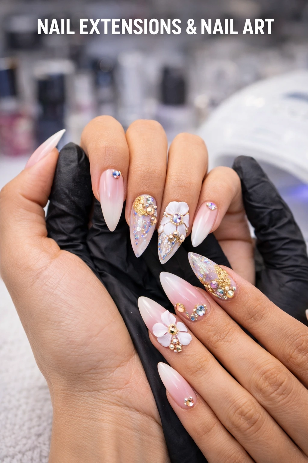 Nail art design with nail extensions, rhinestones and floral details at a salon in Hennur Road Bangalore